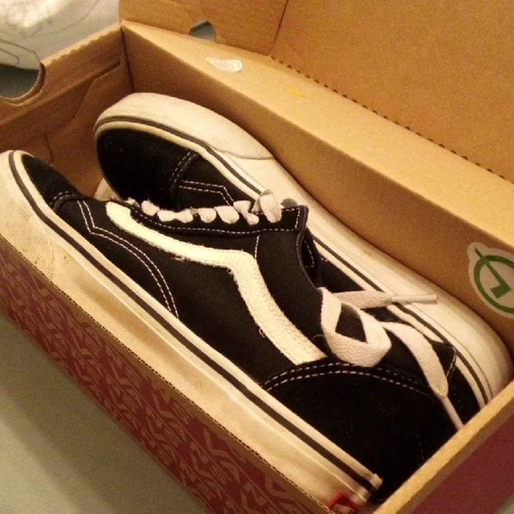 Vans Kids Black and White Sneakers